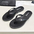 CHANEL THONG SLIPPERS IN BLACK COWHIDE