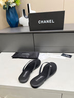 CHANEL THONG SLIPPERS IN BLACK COWHIDE