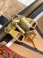 LOUIS VUITTON KEEPALL BANDOULIÈRE 50 IN PARFLECHE PATTERN MONOGRAM CANVAS