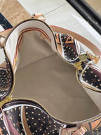LOUIS VUITTON KEEPALL BANDOULIÈRE 50 IN PARFLECHE PATTERN MONOGRAM CANVAS