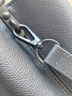LOUIS VUITTON CAPUCINES EAST-WEST 27 IN BLACK TAURILLON