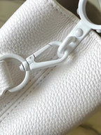 LOUIS VUITTON CAPUCINES EAST-WEST MINI 21 IN WHITE TAURILLON