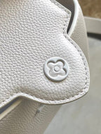 LOUIS VUITTON CAPUCINES EAST-WEST MINI 21 IN WHITE TAURILLON