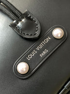 LOUIS VUITTON LV 25S NOÉ CARGO 24 IN BLACK GLOSSY CALFSKIN SILVER HARDWARE