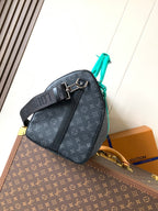 LOUIS VUITTON LV 25S KEEPALL 50 WITH SHOULDER STRAP IN BLACK AQUA COATED MONOGRAM ECLIPSE CANVAS AND CALFSKIN