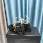 CHANEL MARY JANE WITH PEARL STRAP IN GLOSSY BLACK LAMBSKIN