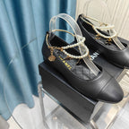 CHANEL MARY JANE WITH PEARL STRAP IN BLACK LAMBSKIN