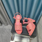 CHANEL THICK-SOLED WEDGE SANDALS IN LIGHT PINK SUEDE