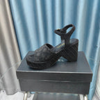 CHANEL THICK-SOLED WEDGE SANDALS IN BLACK SUEDE