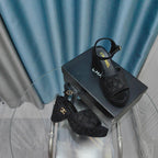 CHANEL THICK-SOLED WEDGE SANDALS IN BLACK SUEDE
