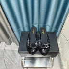 CHANEL MULE IN BLACK TWEED AND LAMBSKIN