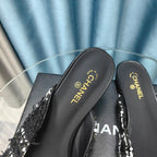 CHANEL MULE IN BLACK TWEED AND LAMBSKIN
