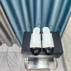 CHANEL MULE IN WHITE TWEED AND BLACK LAMBSKIN