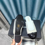 CHANEL MULE IN WHITE TWEED AND BLACK LAMBSKIN