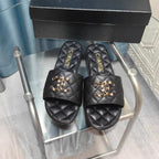 CHANEL QUILTED SLIPPERS BLACK SHEEPSKIN