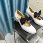 CHANEL HIGH MARY JANE SHOES WHITE SHEEPSKIN WITH BLACK BOW