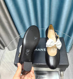 CHANEL HIGH MARY JANE SHOES BLACK SHEEPSKIN WITH WHITE BOW