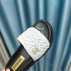 CHANEL KNIT SLIPPERS IN LIGHT PINK WOVEN SATIN AND BLACK SHEEPSKIN
