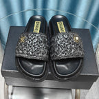 CHANEL KNIT SLIPPERS IN BLACK WOVEN SATIN AND SHEEPSKIN