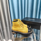 CHANEL SHORT BOOTS IN GOLD YELLOW SUEDE AND BLACK SHEEPSKIN