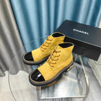 CHANEL SHORT BOOTS IN GOLD YELLOW SUEDE AND BLACK SHEEPSKIN
