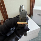 CELINE TEEN NINO BAG 20 IN BLACK TRIOMPHE CANVAS GOLD HARDWARE