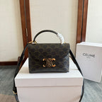 CELINE TEEN NINO BAG 20 IN BLACK TRIOMPHE CANVAS GOLD HARDWARE