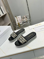 DIOR CD DWAY PLATFORM SLIDE IN BLACK AND WHITE COTTON STRIPED SOLE