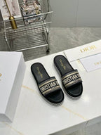 DIOR CD DWAY PLATFORM SLIDE IN BLACK AND WHITE COTTON STRIPED SOLE