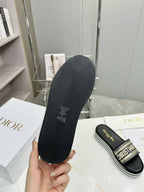 DIOR CD DWAY PLATFORM SLIDE IN BLACK AND WHITE COTTON STRIPED SOLE