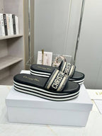 DIOR CD DWAY PLATFORM SLIDE IN BLACK AND WHITE COTTON STRIPED SOLE