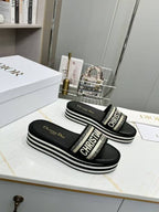 DIOR CD DWAY PLATFORM SLIDE IN BLACK AND WHITE COTTON EMBOSSED LOGO