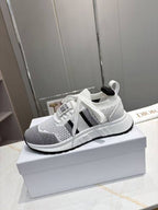 DIOR CD RUN SNEAKER 25S IN BLACK AND WHITE MESH FABRIC TWO-TONE SOLE