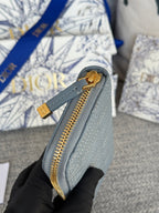 DIOR VERTICAL LONG ZIP WALLET 20 IN BABY BLUE QUILTED ALLOVER CALFSKIN