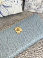 DIOR VERTICAL LONG ZIP WALLET 20 IN BABY BLUE QUILTED ALLOVER CALFSKIN