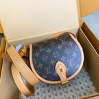 LOUIS VUITTON SADDLE BAG 18 IN BROWN MONOGRAM CANVAS AND LEATHER TRIM