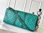LOUIS VUITTON KEEPALL BANDOULIÈRE 50 IN GREEN MONOGRAM HERITAGE CANVAS