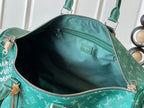 LOUIS VUITTON KEEPALL BANDOULIÈRE 50 IN GREEN MONOGRAM HERITAGE CANVAS
