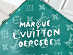 LOUIS VUITTON KEEPALL BANDOULIÈRE 50 IN GREEN MONOGRAM HERITAGE CANVAS