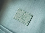 LOUIS VUITTON DISCOVERY BACKPACK 38 IN GREEN MONOGRAM HERITAGE CANVAS