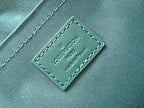 LOUIS VUITTON POCHETTE VOYAGE SOUPLE 32 IN GREEN MONOGRAM HERITAGE CANVAS