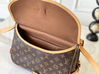 LOUIS VUITTON SAUMUR BB 28 IN BROWN MONOGRAM CANVAS AND LEATHER TRIM GOLD HARDWARE
