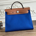 HERMES ZIP CABINE 31 BAG IN COBALT BLUE CANVAS AND BRONZE BROWN CALFSKIN