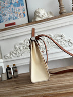 HERMES ZIP CABINE 31 BAG IN WHITE CREAM CANVAS AND BRONZE BROWN CALFSKIN