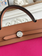 HERMES ZIP CABINE 31 BAG IN FUCHSIA PINK CANVAS AND BRONZE BROWN CALFSKIN