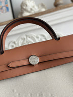 HERMES ZIP CABINE 31 BAG IN PALE GRAY CANVAS AND BRONZE BROWN CALFSKIN