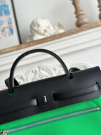 HERMES ZIP CABINE 31 BAG IN EMERALD GREEN CANVAS AND BLACK CALFSKIN