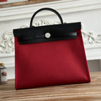 HERMES ZIP CABINE 31 BAG IN RUBY RED CANVAS AND BLACK CALFSKIN