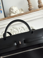 HERMES ZIP CABINE 31 BAG IN BLACK CANVAS AND CALFSKIN