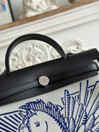 HERMES ZIP CABINE 31 BAG IN WHITE CANVAS AND BLACK CALFSKIN